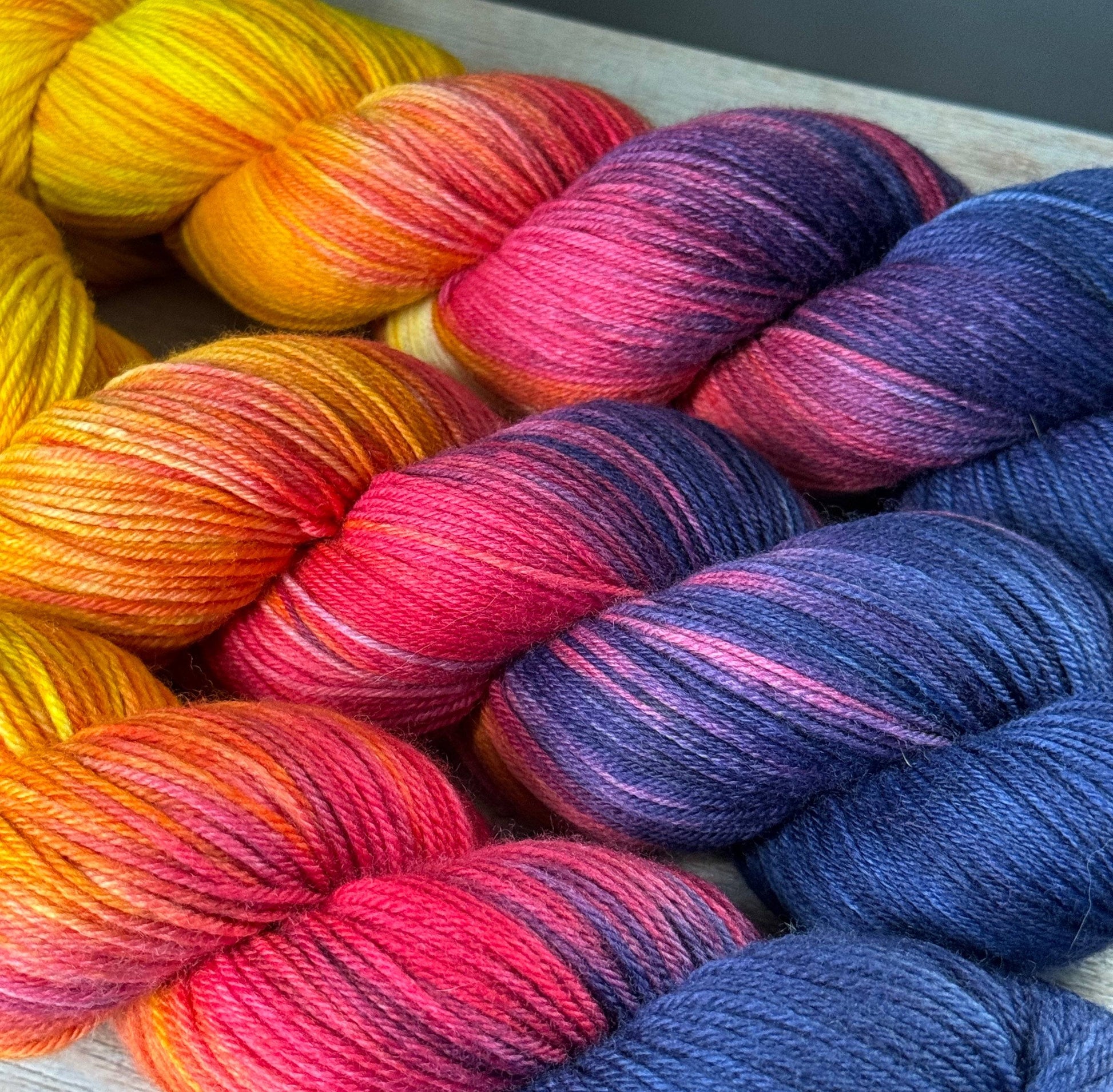 several skeins of yarn in different colors