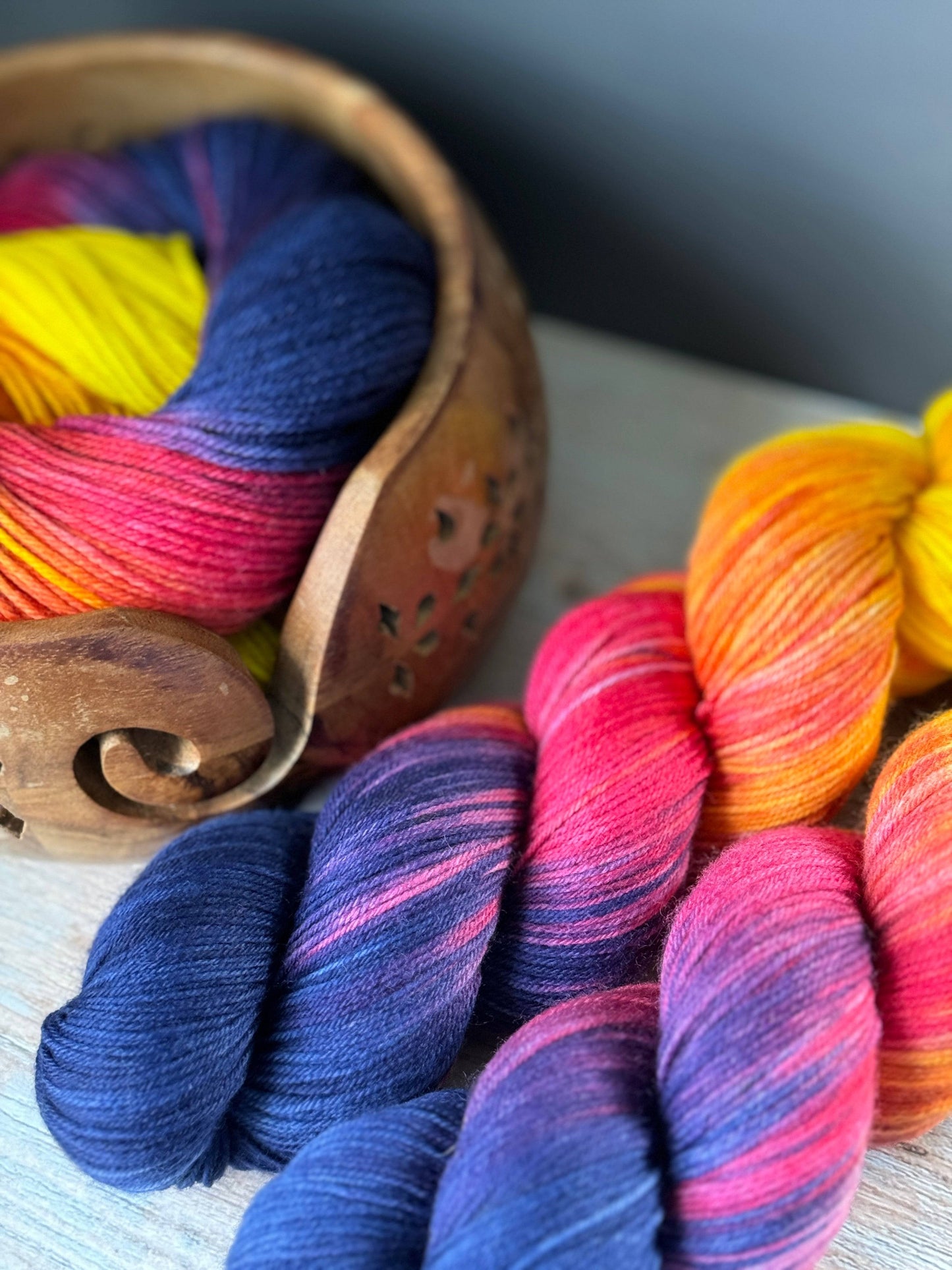 several skeins of yarn sitting on a table